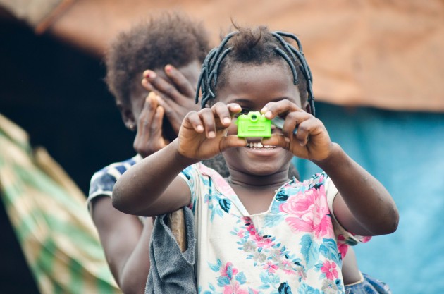 This young girl returned the favor after I pointed my camera in her direction. (MPR Photo/Nate Minor)